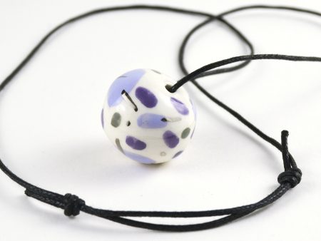 Mauve & Platinum Ceramic Bead. Bead 2 x 2.8 cm (0.78 x 1.10 in). Sliding knot cotton string 38 cm (14.96 in). Handmade by Gruni.