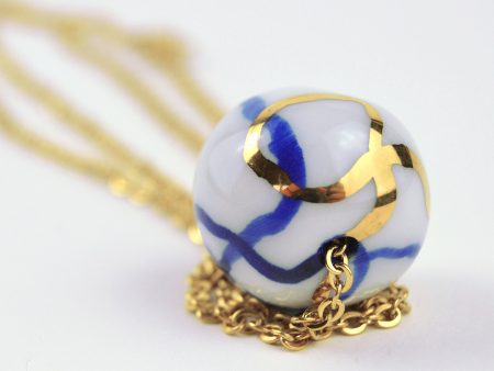 Porcelain Pendant with Ball Lightning. Bold unisex design. Hand painted with real gold. 30 cm (11.81 in). Bead: 2 cm (0.78 in). Handmade by Gruni.