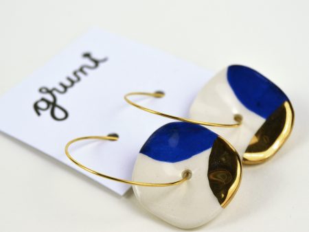 Circle Hoop Earrings, Blue & Gold. 2.5 x 4 cm (0.98 x 1.57 in) Handmade, irregular circle. Hand painted on both sides. Stainless steel hoops. Gruni