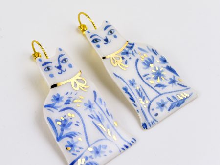 Delft Blue Cat Earrings. 3 x 6 cm (1.18 x 2.36 in). Hand painted with blue and gold/platinum. Brass findings. Handmade by Gruni.