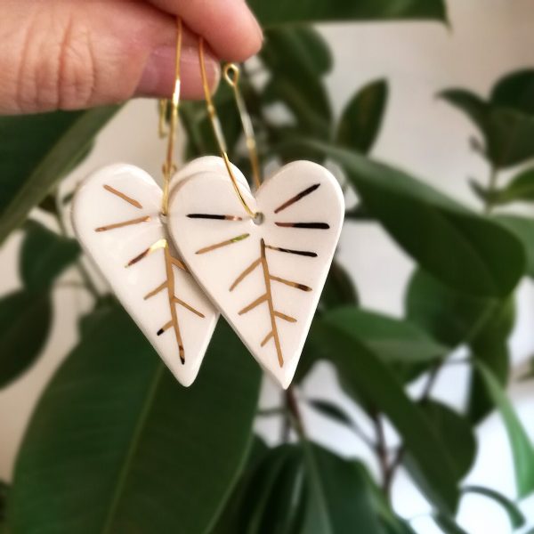 White Leaf Hoop Earrings. Ceramics decorated with real gold. Creative jewelry. 3.2 x 7.5 cm (1.25 x 2.95). 8 g (0.28 oz). Made by Gruni.