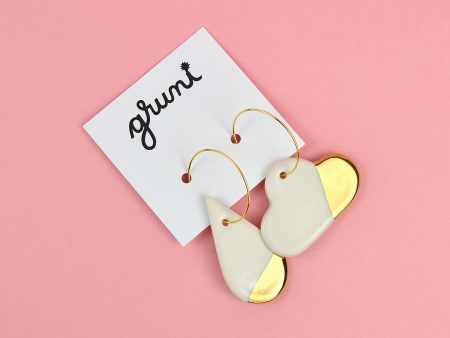 Asymmetrical Cloud & Rain Hoop Earrings. Ceramics decorated with real gold. Creative, fun jewelry. Stainless Steel Hoops. Made by Gruni.
